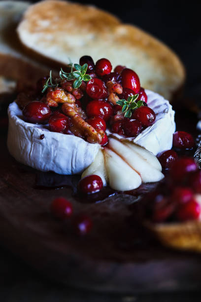 Baked Brie with Honey, Walnuts, Cranberries